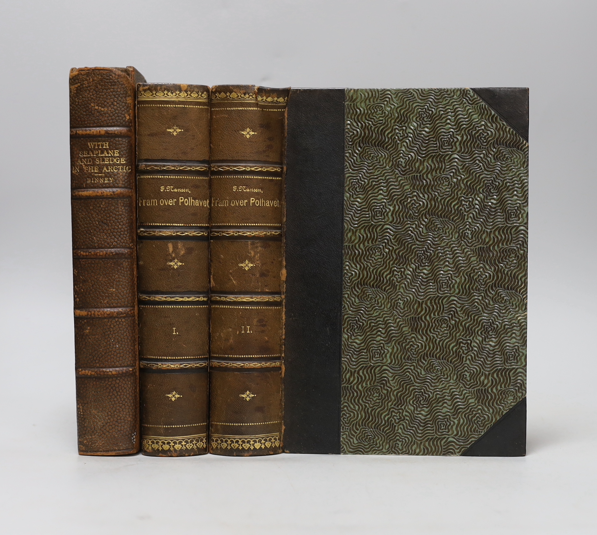 Nansen, Fridtjof - Fram over Polhavet: den Norske Polarfaerd 1893-1896. 2 vols. photogravure portrait, 42 plates (3 coloured and folded) and 3 coloured and folded maps; contemp. half morocco and cloth, patterned e/ps. Kr